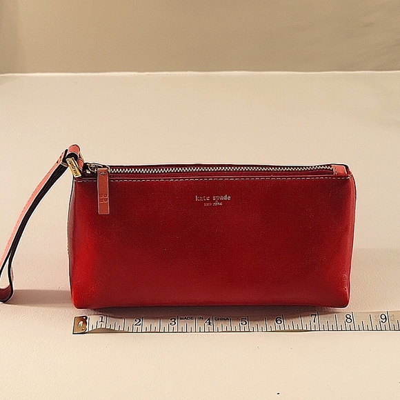 kate spade Handbags - Kate Spade Leather Wristlet - Red with Pink Trim. Great used condition